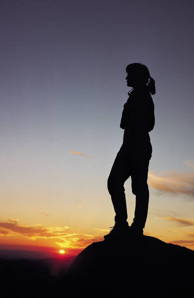 Woman on te mountain top